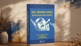 Mockup sampul buku Eko-Akunta-Nesia: Teori, Konsep, dan Konteks karya Muhammad Aras Prabowo, Meutia, Windu Mulyasari, dan Agus Sholikin Yulianto. Buku berwarna biru dengan ilustrasi grafik pertumbuhan ekonomi dan peta Indonesia, dipajang di atas meja kayu dengan latar dinding bernuansa krem dan aksen biru emas.