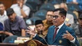 Idham Arsyad saat mengikuti ujian terbuka doktor di Universitas Brawijaya, Malang, Selasa (14/7).