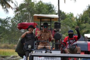 30 Combine Harvester Bergerak Bersama, Panen Raya IP 300 di Bila Riase Jadi Sorotan